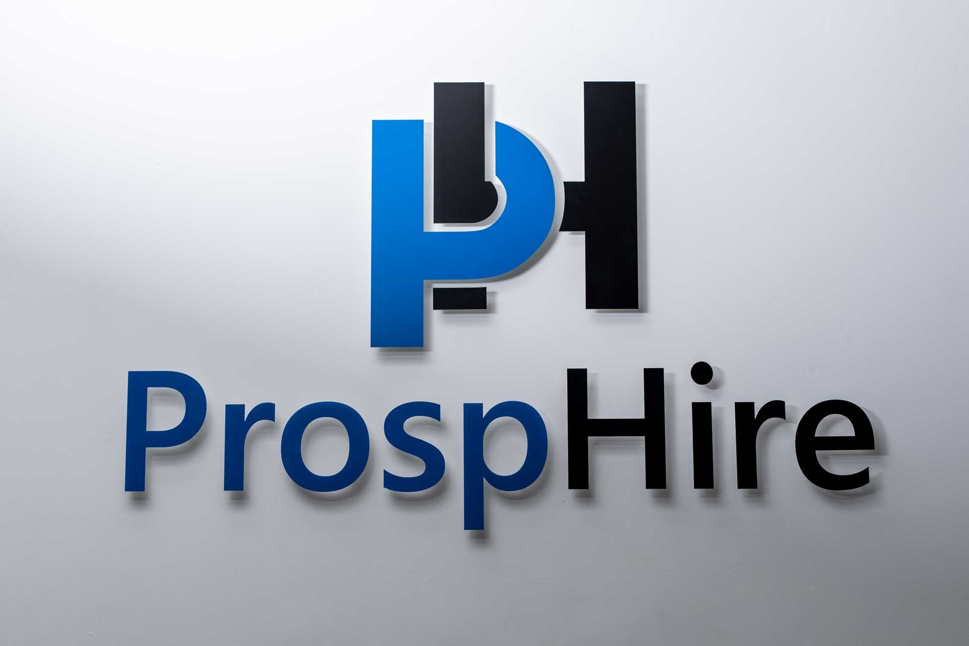 ProspHire logo on a wall