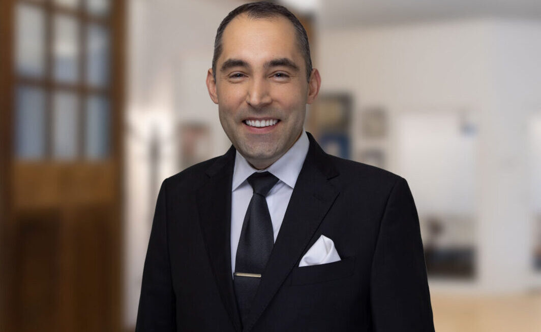 Chris Miladinovich with blurred background